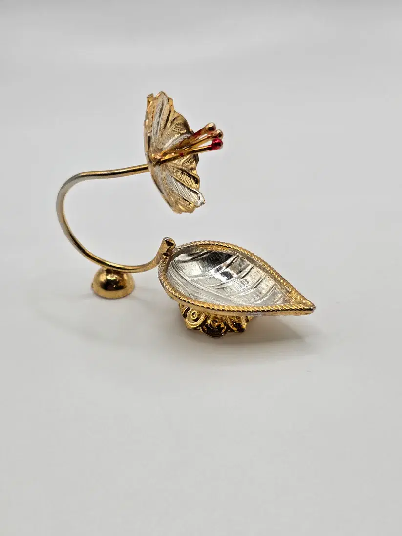 Gold plated flower diya