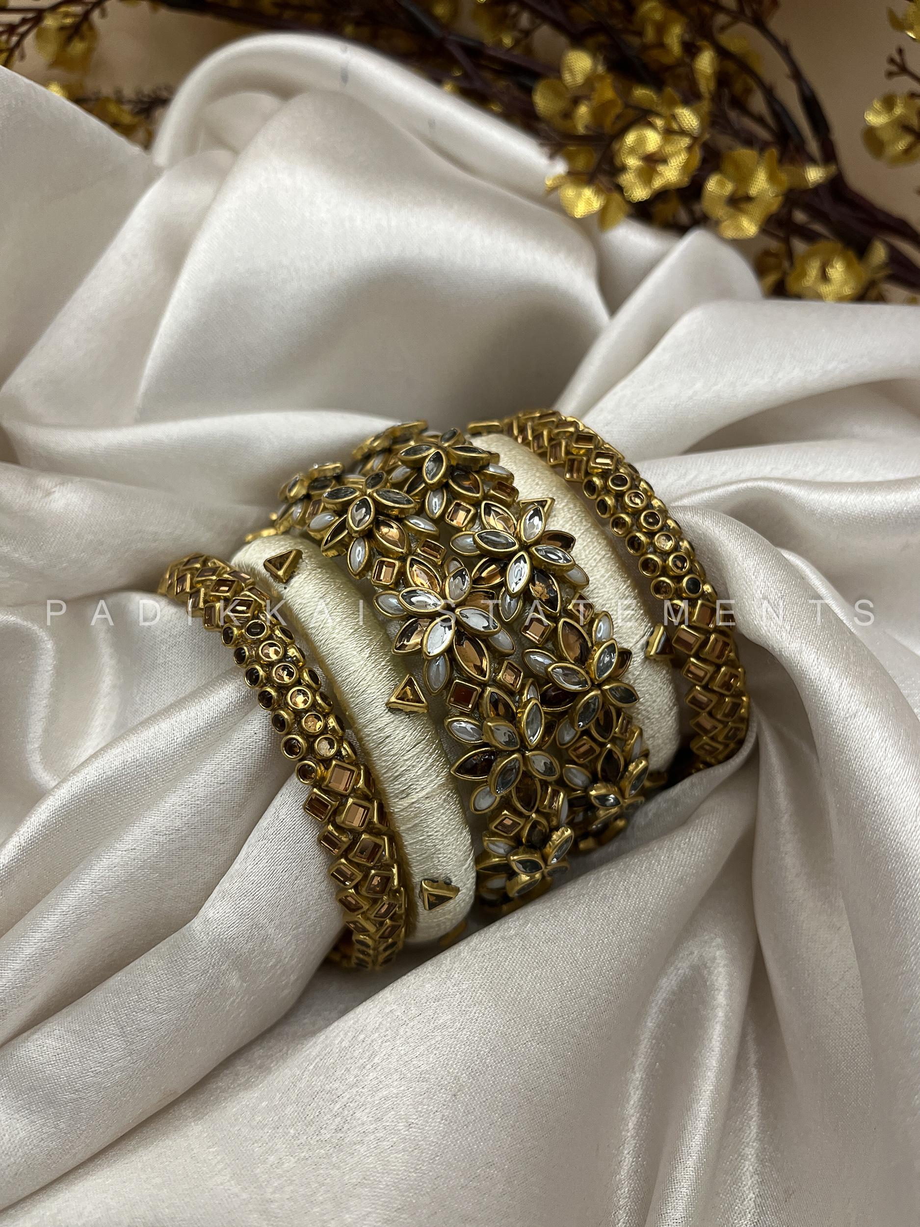 Divya Pushpa Aura Kundan Set - Ivory and Gold