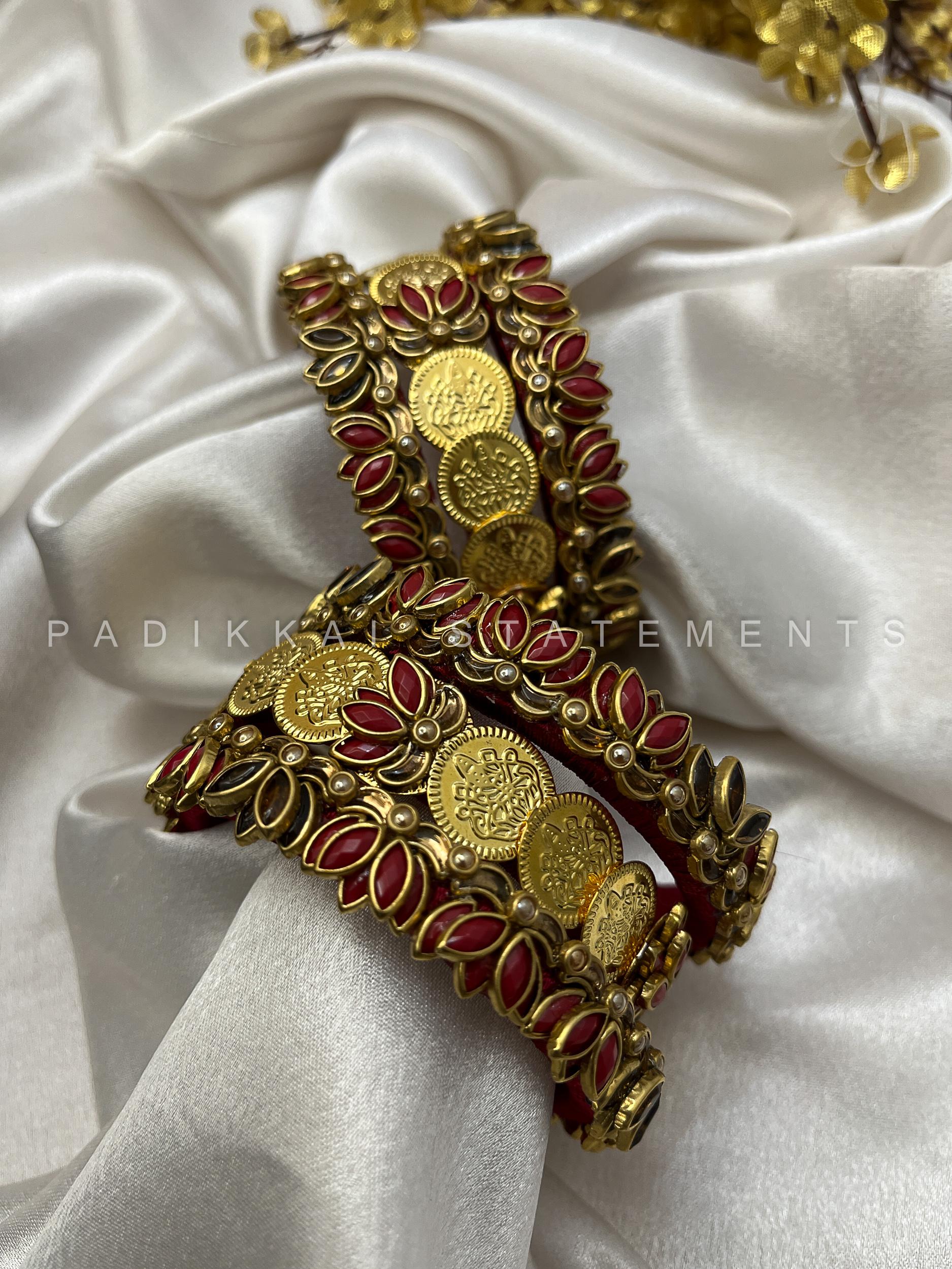 Shree Kamalam Festive Kundan Set - Gold and Maroon Shree Kamalam Festive Kundan Set - Gold and Maroon